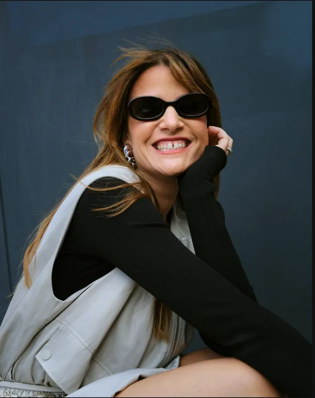 Saskia Jung in a black blazer and sunglasses.